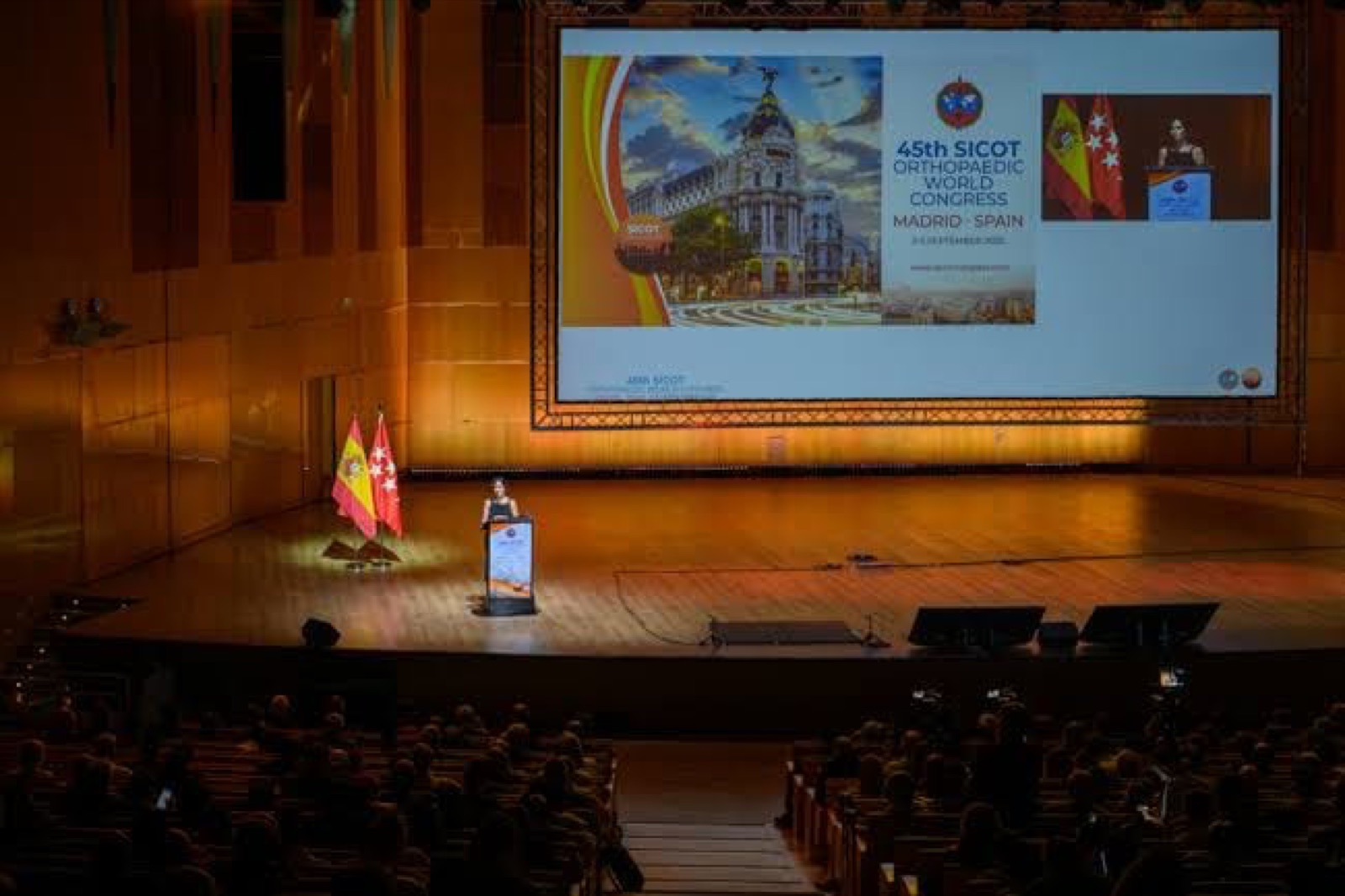 The main stage of the 45th SICOT World Congress in Madrid, with the congress screen behind the speaker
